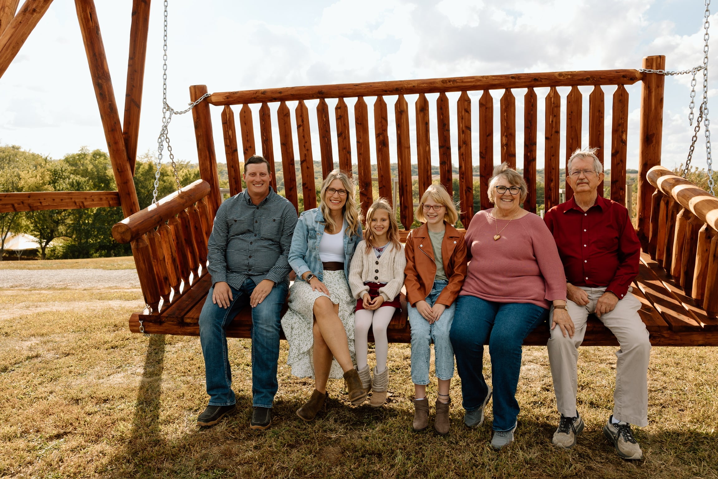 The family behind Historic Weston Orchard and Vineyard together at the farm