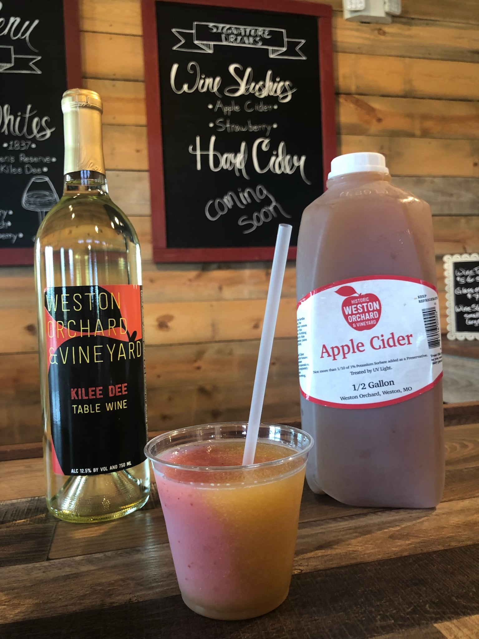 Wine tasting in the Cider Barn at Historic Weston Orchard and Vineyard