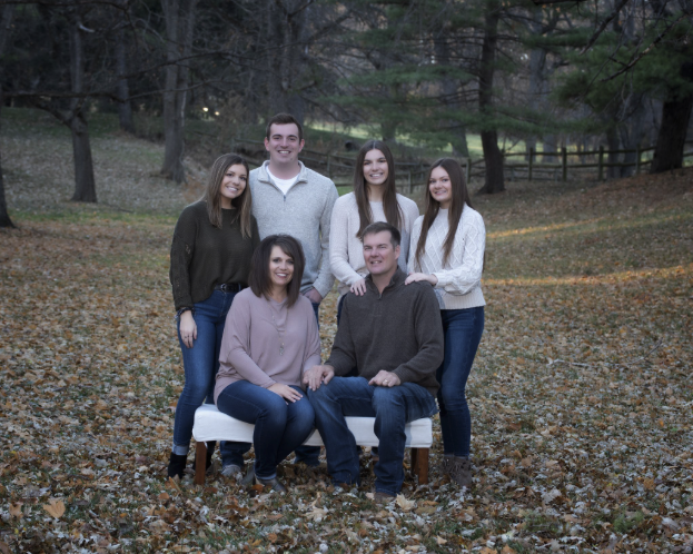 The family behind Historic Weston Orchard and Vineyard together at the farm